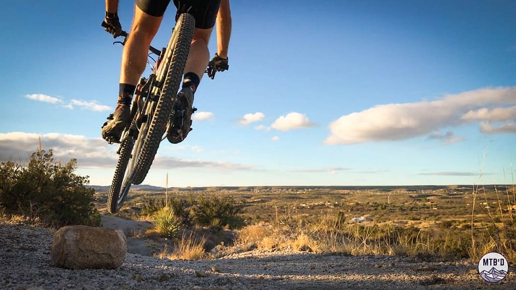 Mountain biker riding The Chutes descent on 50 Year Trail in Tucson Arizona