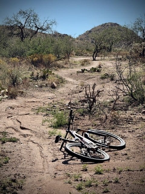Bike at the side of the trail on 24 HOP course.